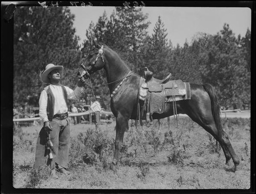 Rodeo performer and horse, Lake Arrowhead Rodeo, Lake Arrowhead, 1929 ...