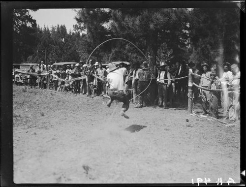 Rodeo performer doing rope trick, Lake Arrowhead Rodeo, Lake Arrowhead, 1929