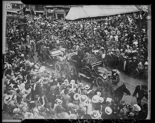 Theodore Roosevelt riding in open car in downtown Los Angeles, Los Angeles, 1911