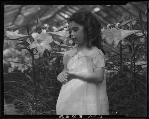 Diane King among Easter lilies, 1934