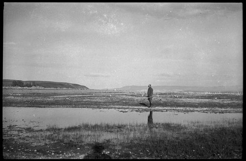 Man standing on shore of Mono Lake, Mono County, [1929?]