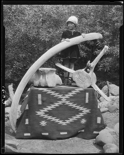 Carolyn Bartlett and whale bones, Santa Monica, 1928