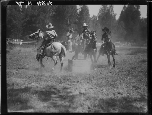 Rodeo riders performing, Lake Arrowhead Rodeo, Lake Arrowhead, 1929