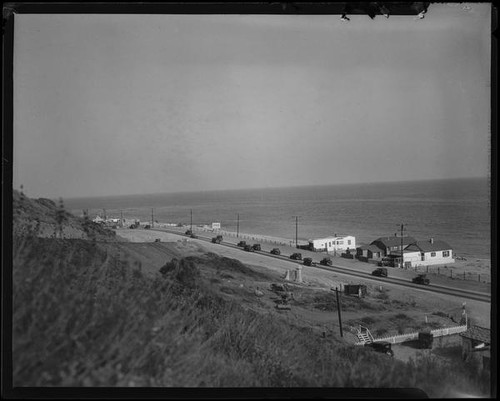 View down slope towards beach houses in the Rancho Malibu la Costa development, Malibu, circa 1927