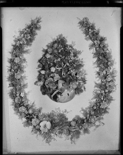 Horseshoe-shaped shell art wreath made in 1888 by poet Ina Donna Coolbrith, Santa Monica, 1953