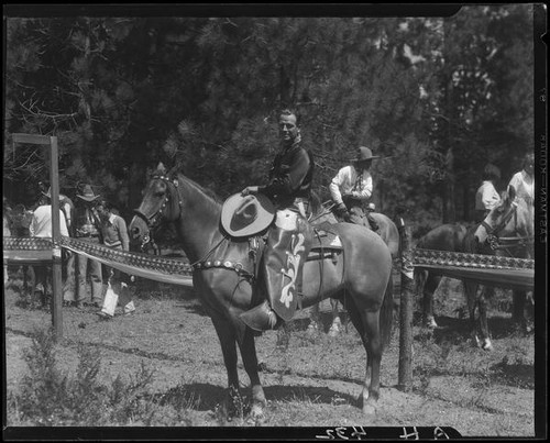 Actor Reginald Denny on horseback, Lake Arrowhead Rodeo, Lake Arrowhead, 1929