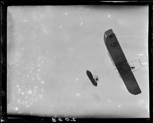 Biplane in air, photographed from below, Tanforan Racetrack, San Bruno, 1911