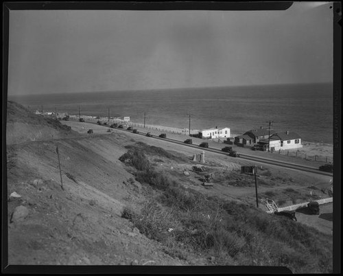 View towards three beach houses in the Rancho Malibu la Costa development, Malibu, circa 1927