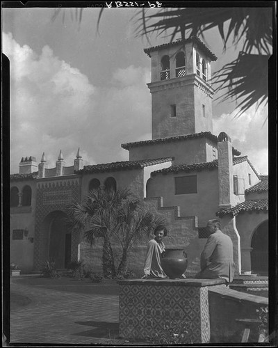 Couple seated in front of the Hotel Playa Ensenada, Ensenada, 1931