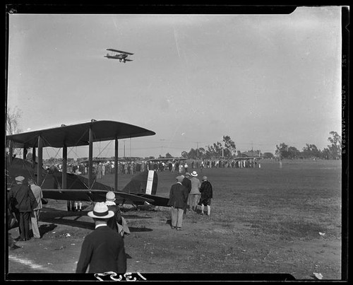 Biplanes and crowd, [1920s?]