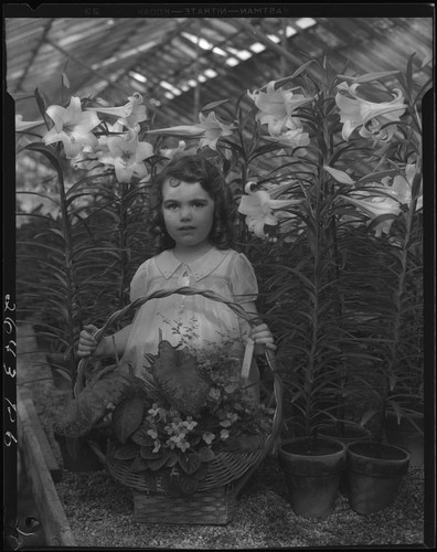 Diane King with flower basket, 1934