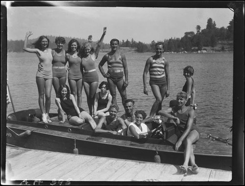 Young people in motorboat "Graceful" at dock, Lake Arrowhead, 1929