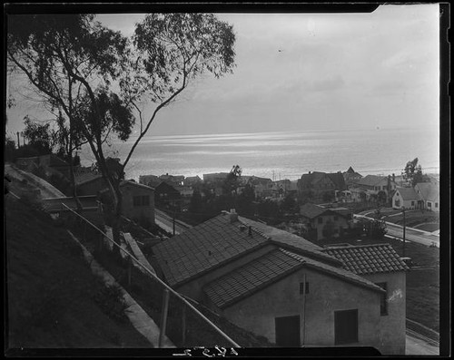 View from residential hillside in Santa Monica Canyon towards the Pacific ocean, 1928