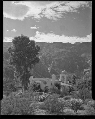 El Kantara, house with onion dome, horseshoe arches, and tiled roof, Palm Springs, [1930s or 1940s?]