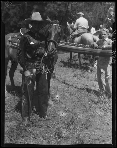 Actor Reginald Denny and horse, Lake Arrowhead Rodeo, Lake Arrowhead, 1929