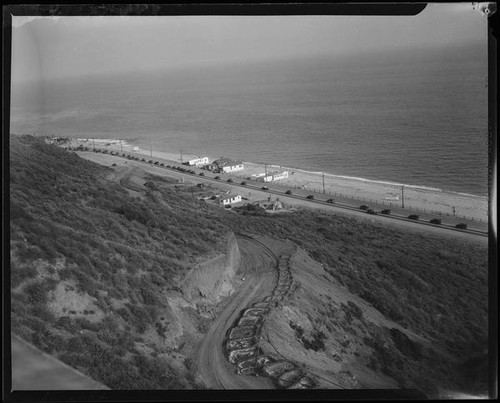 View down slope towards beach houses in the Rancho Malibu la Costa development, Malibu, circa 1927
