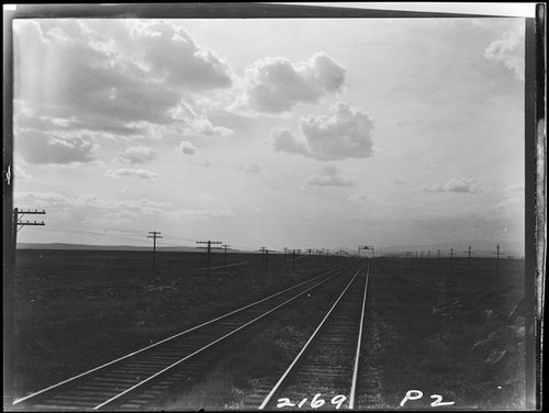 Railroad tracks and clouds, Kansas, Colorado, or New Mexico, 1925