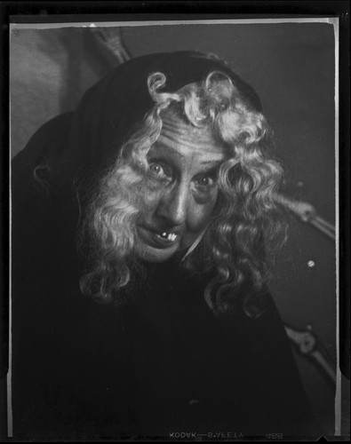 Lucille S. King, actress and ventriloquist, dressed as a witch, 1951