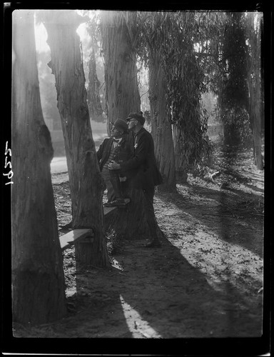 Adelbert Bartlett and another man among eucalyptus trees, Laguna Beach, 1925