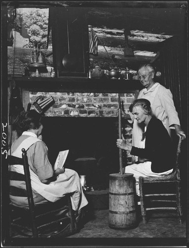 Laura Case Clark, Mollie Case, and Floretta Sheets at fireplace in log cabin, San Bernardino, 1925, 1926, or 1928