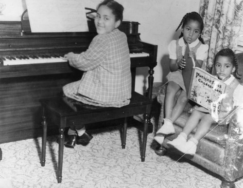 Girls with piano