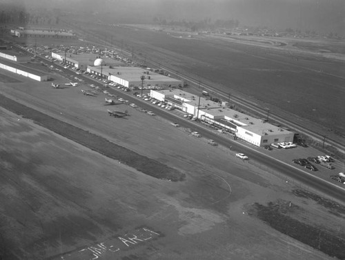 Hughes Aircraft, Fullerton Airport, and Superior Fireplace Co.; looking northwest