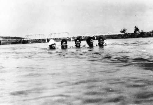 American Indian girls swimming in the Santa Ana River