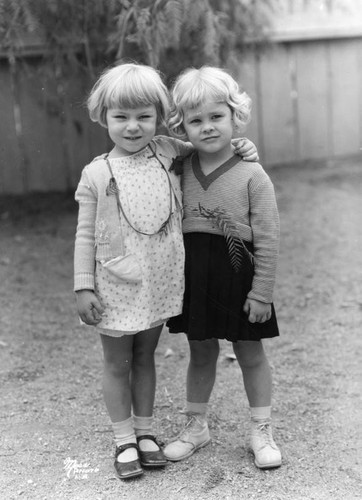 Two girls embracing