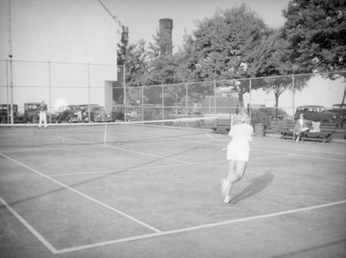 Playing tennis