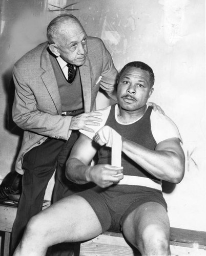 Jack Kearns and Archie Moore