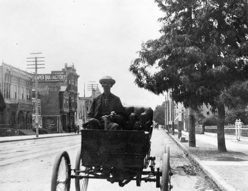 Man in car on Spring St