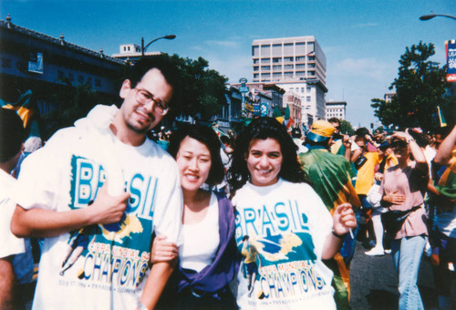 Friends attending a celebratory parade