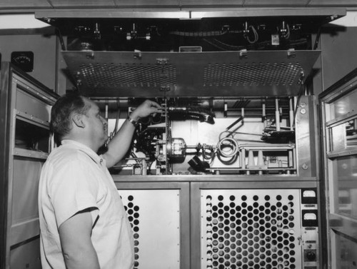 Man showing TV equipment