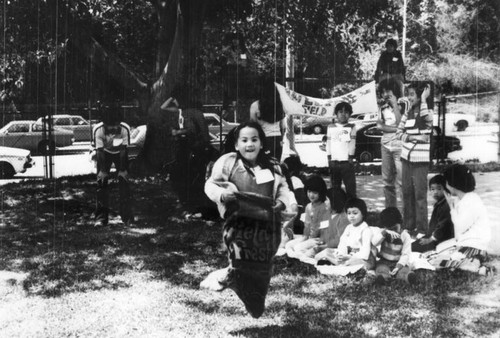 Girl in sack race