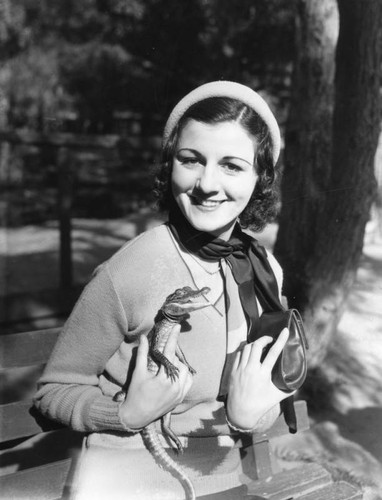 Woman with baby alligator