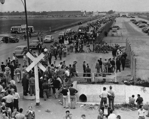 Pickets parade in front of main gate