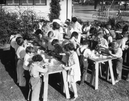 Children learning soap sculpture, view 5