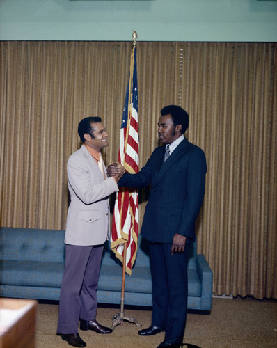 Billy Mills with unidentified man at Los Angeles City Hall