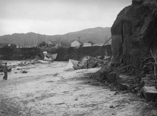 L.A. River flooding, houses on the riverbed in North Hollywood