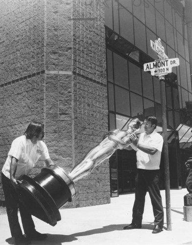 Large Oscar outside new Academy Headquarters