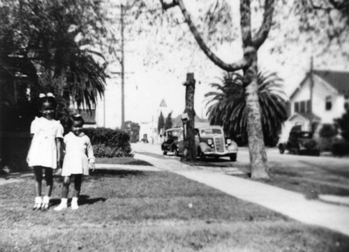 Sisters in front yard