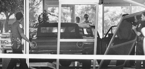 Car in lobby of Federal Building