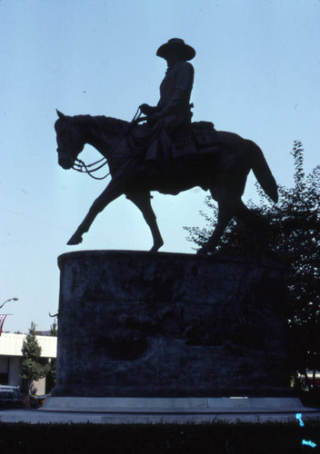 Statue outside Great Western Savings branch