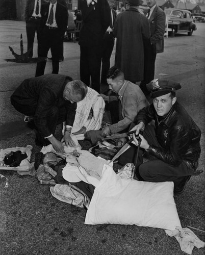 Knives in evacuee's baggage