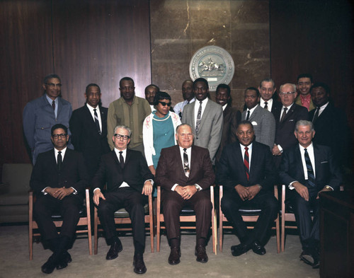 Postmasters Leslie Shaw and Joseph Causey with unidentified group