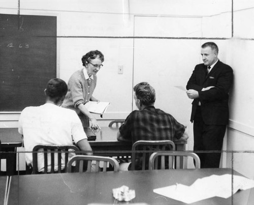 Test technician Margo McDonald administers carpentry aptitude test