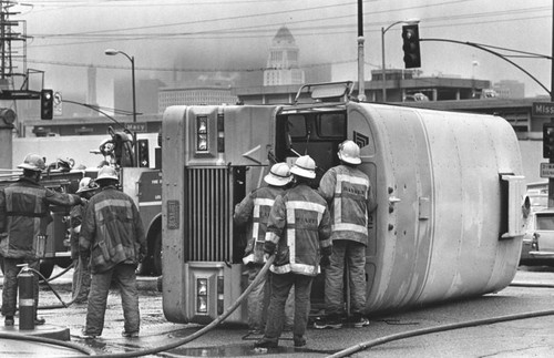 Overturned bus on Mission and Macy