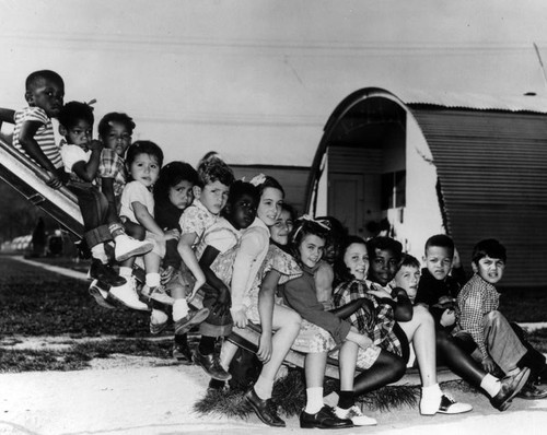 Children on a slipper slide