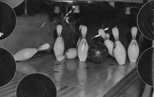 Bowling ball and pins