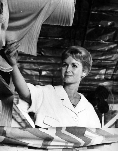 Debbie Reynolds selects fabrics for her originals